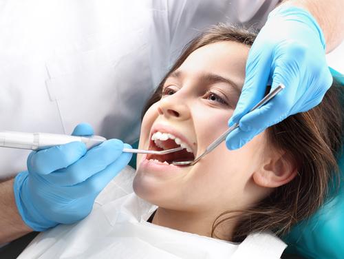 Kids dentistry child getting dental work